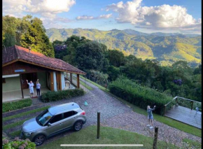Casa do Curupira - 3 dormitórios com cozinha e vista incrível perto de Campos do Jordão